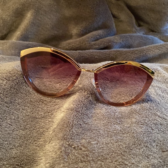 NWOT Authentic Prada sunglasses. These are rare glasses and brand new. No marks - Picture 2 of 7